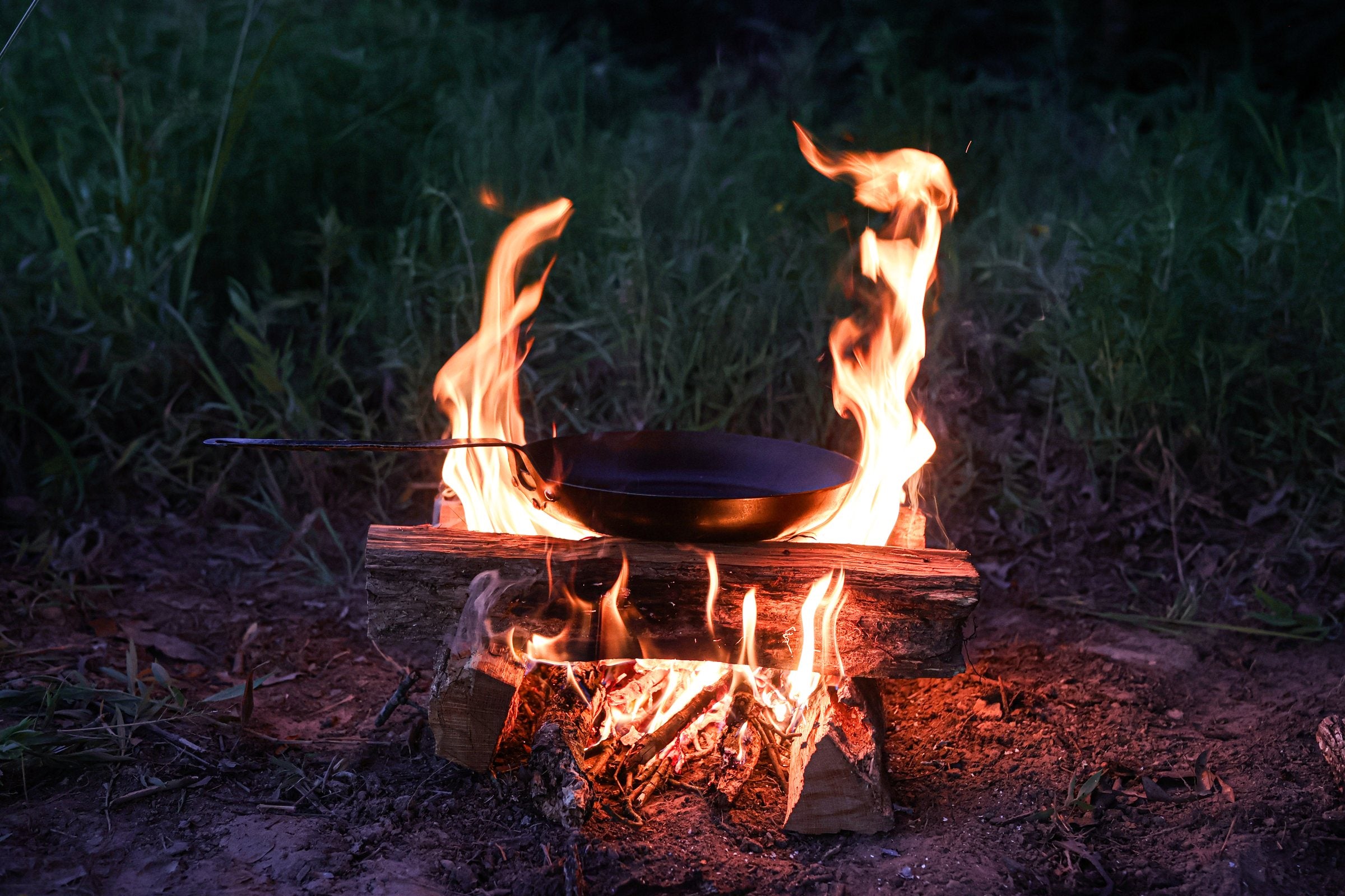 Texas Pan Company carbon steel skillet over an open fire